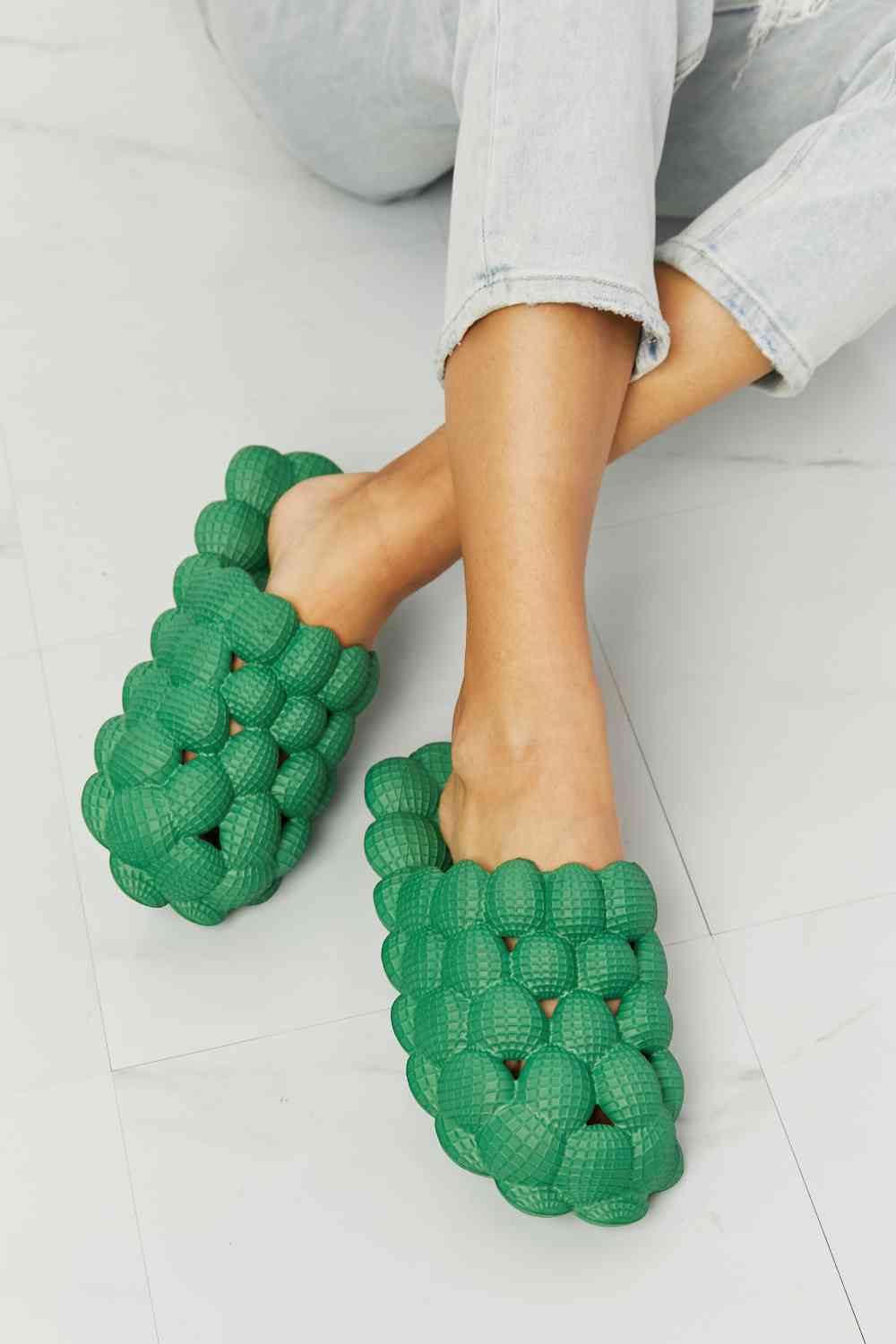 NOOK JOI Laid Back Bubble Slides in Green - Opulence & Essence