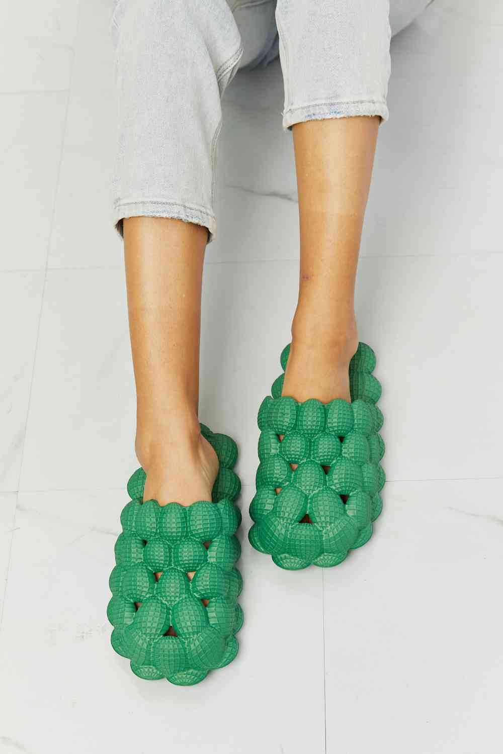 NOOK JOI Laid Back Bubble Slides in Green - Opulence & Essence