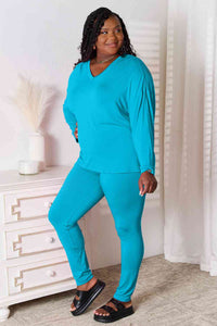 Thumbnail for Sustainble Full Size V-Neck Soft Rayon Long Sleeve Top and Pants Lounge Set - Opulence & Essence